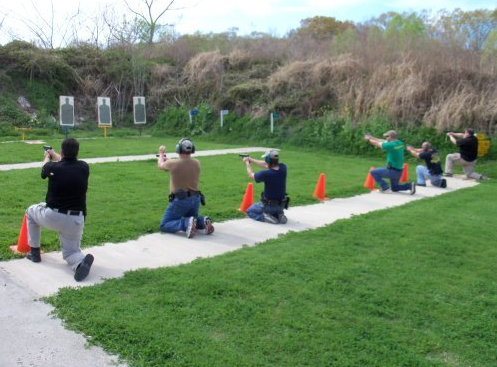 6 officers kneeling at the shooting range