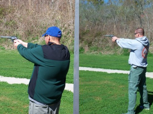 2 offices in a shooting stance at the shooting range