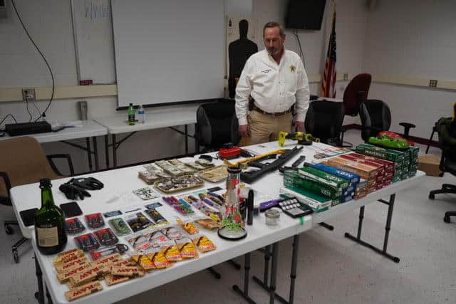 Sheriff Wilson with all of the stolen items.