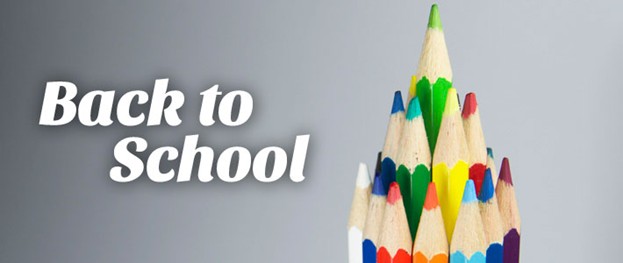 Pencils arranged in the shape of a pyramid and the text, Back to School.