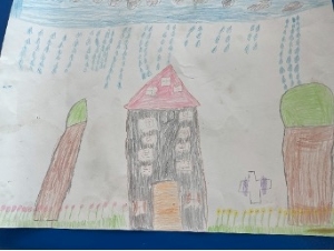 A home with trees and a yard.