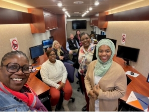 Ladies in a room at the WorkSource workshop.