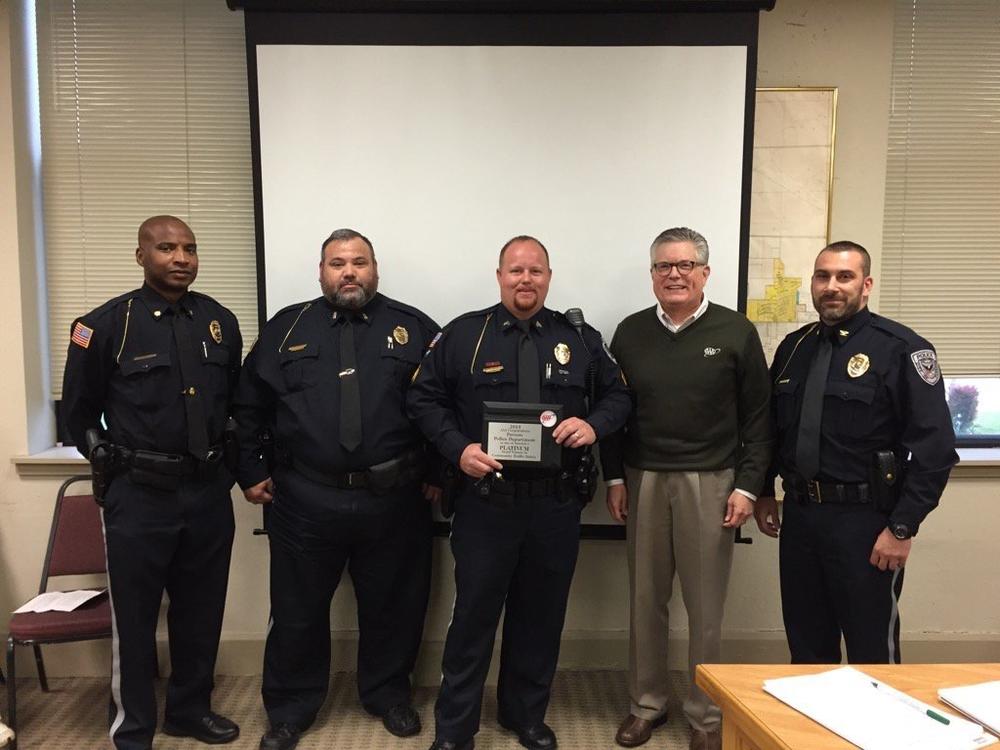 5 members of the Parsons PD