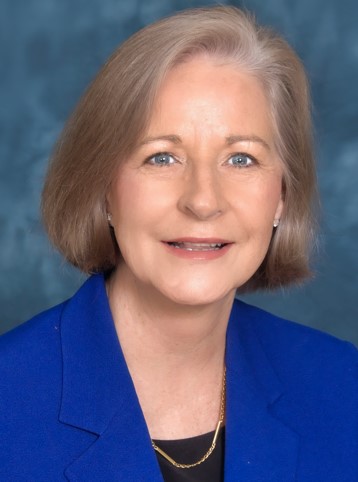 Della Booth - Chairwoman.
