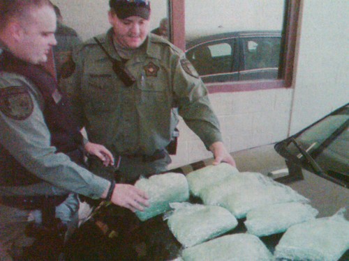 DEPUTIES REYNOLDS AND WATLINGTON WITH CONFISCATED DRUGS
