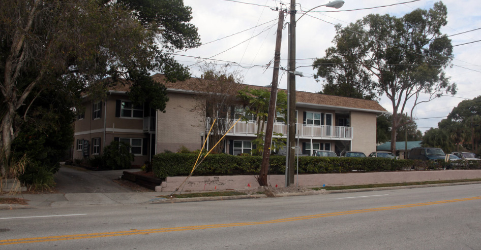 A tan apartment building.