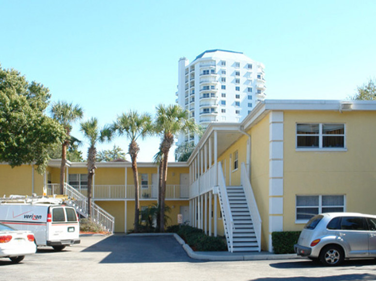 A yellow apartment complex.