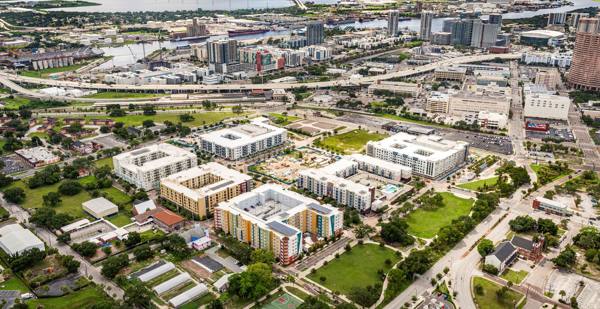 Aerial View of the Encore Buildings (Reed, Ella, Tempo, Trio), Job Training Center, Urban Farm, St. James Church, Solar Art at Technology Park, the Independence, Legacy, and Lot 12 (Adderley)