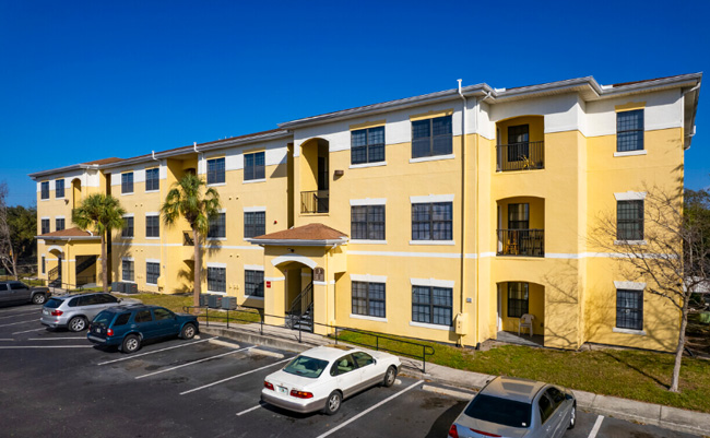 Full front of the Gardens at South Bay building.