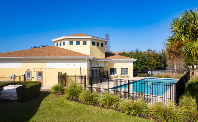 Fenced in pool area.