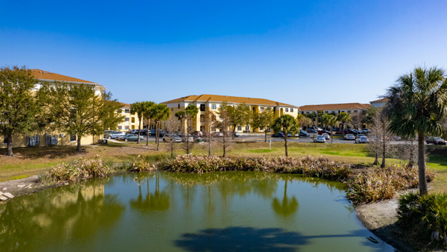 A lake at Gardens at South Bay apartments.