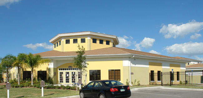 Parking lot and side of apartment building.