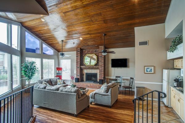 A living room with hardwood flooring.