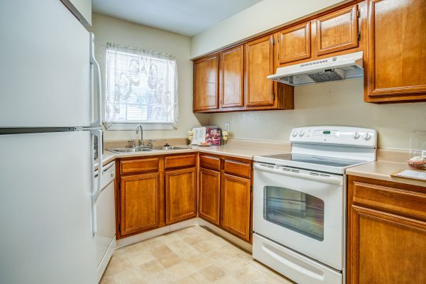 A brightly lit kitchen area.