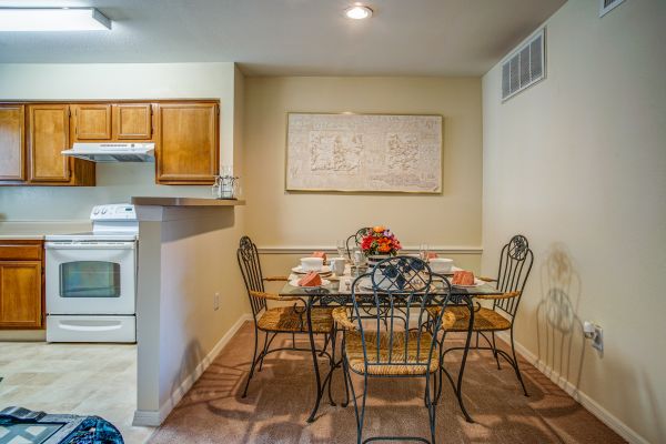 A dining room are with a table.