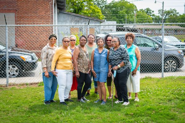 Group of volunteers posing for a group photo. 