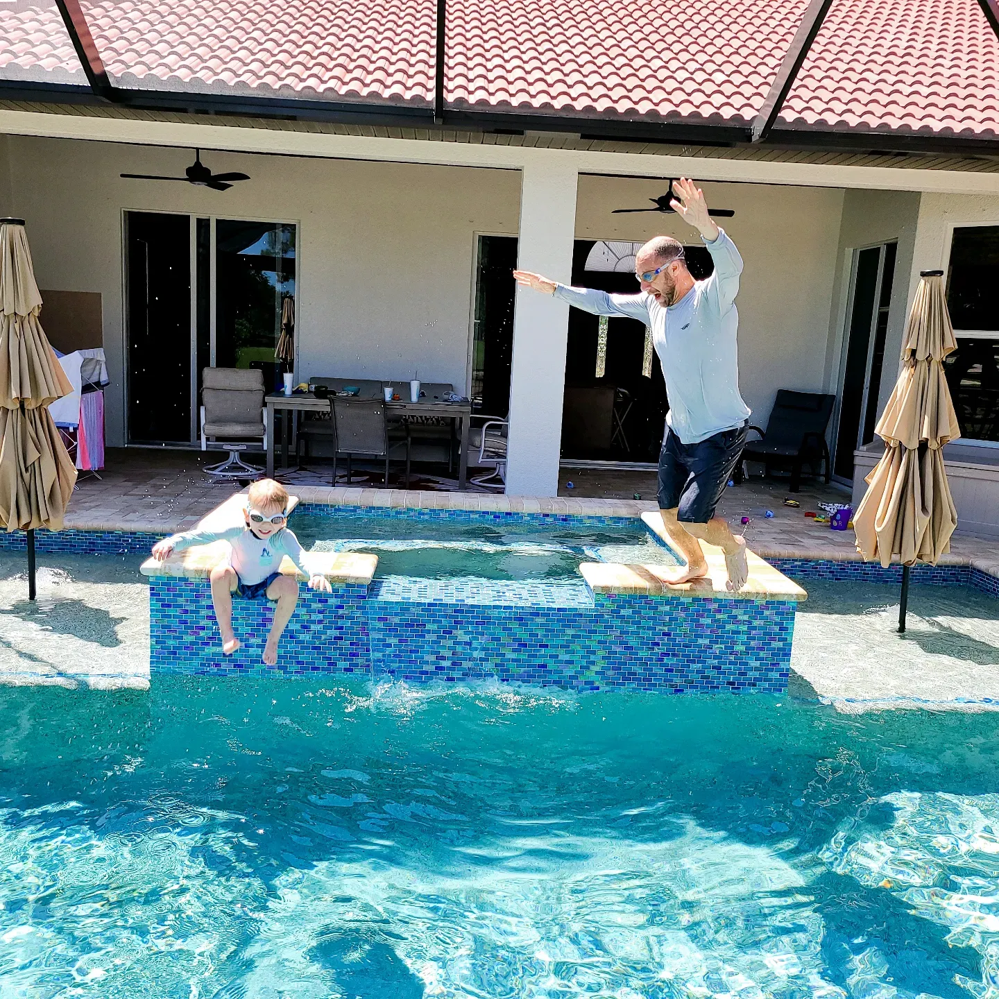 Lucas and Daddy loved to practice their jumps in the pool when we lived in Florida 
