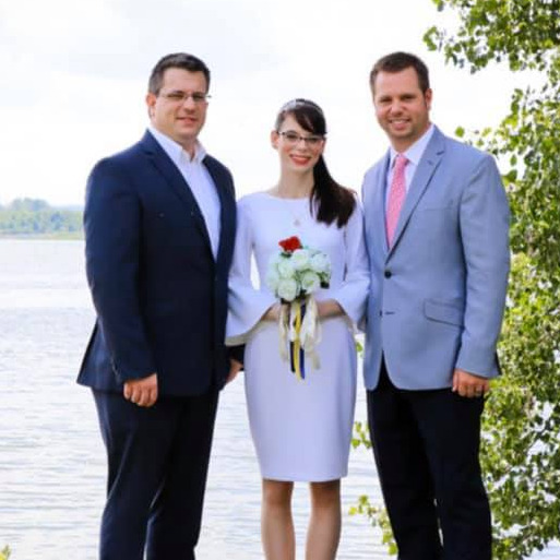 Justin and his siblings, Brandon and Marie at Marie's wedding.