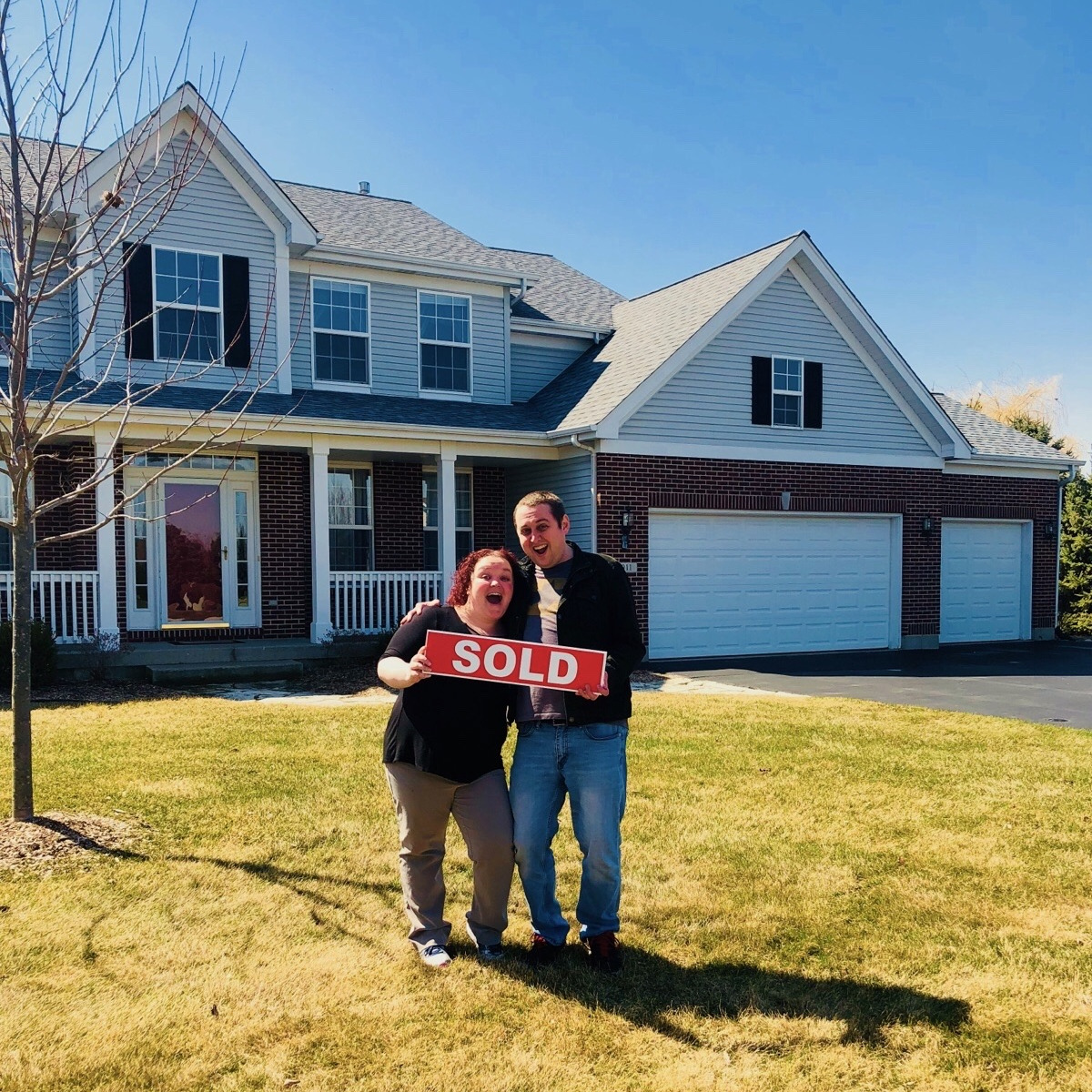 Being goofy and celebrating closing on our house