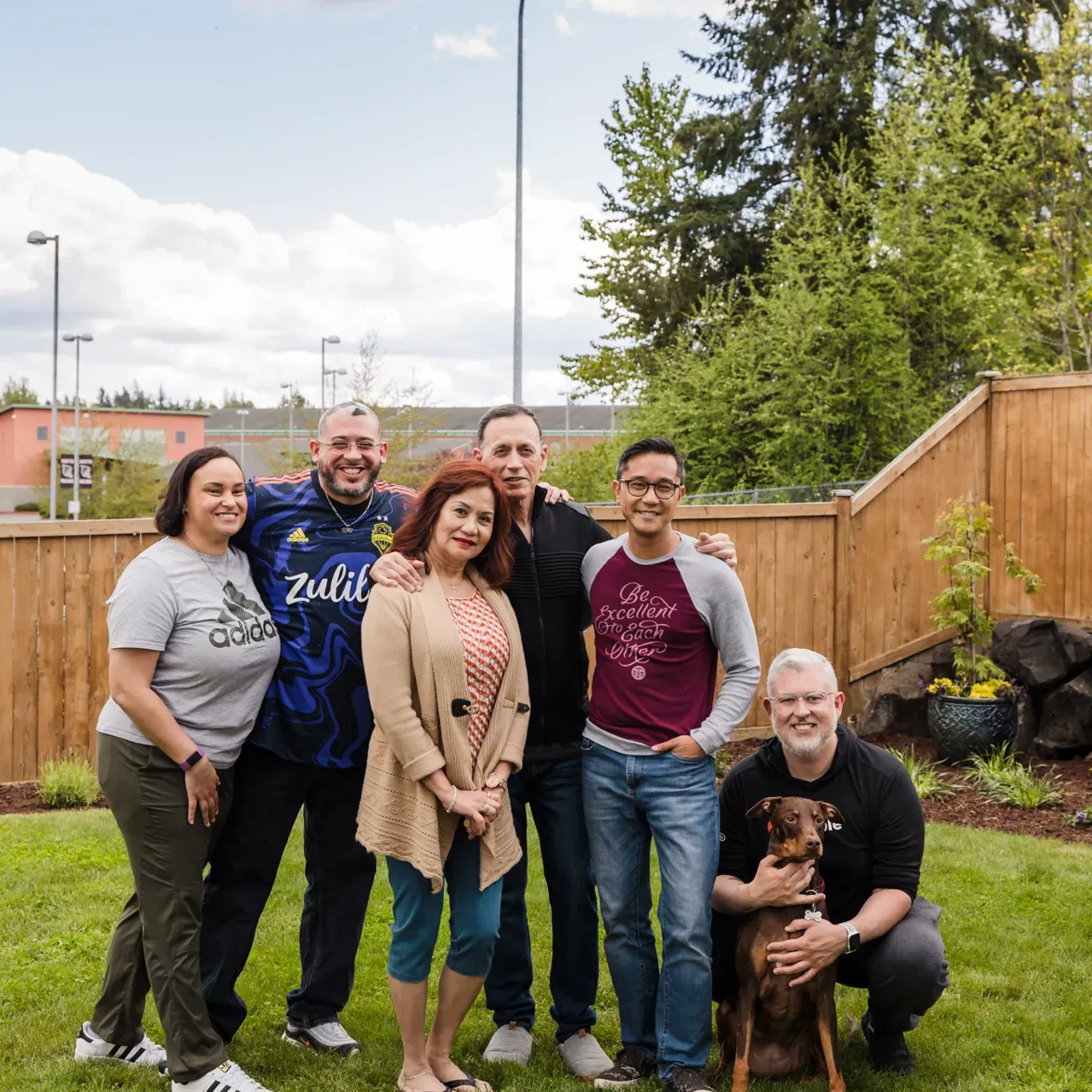 family hanging in the backyard