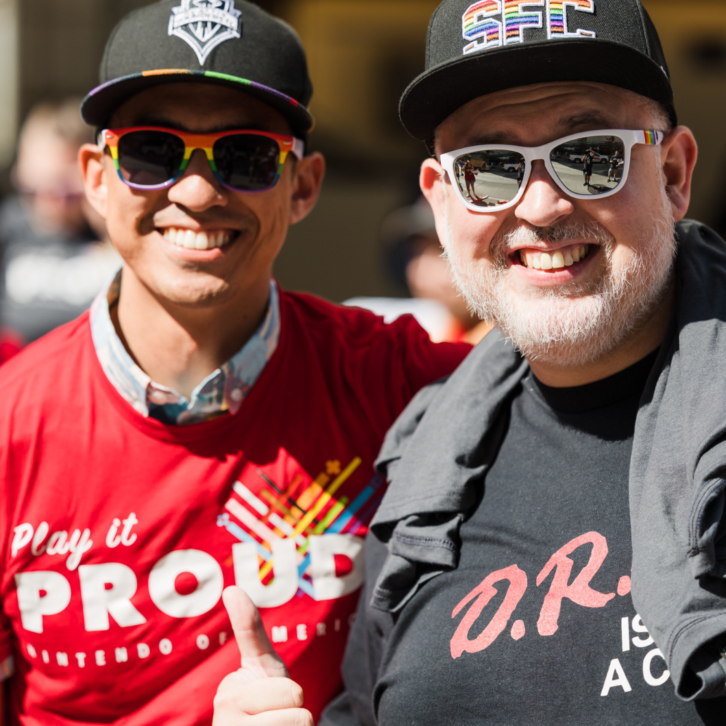 Jon marching with his company, Nintendo, and our really good friend that currently in medical school 