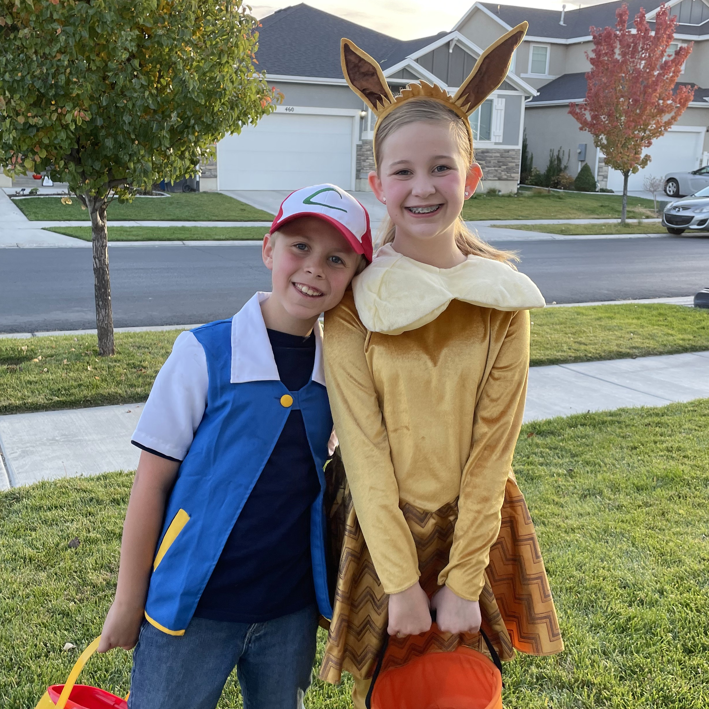 Our Pokémon trainer with his Pokémon, Evee!
