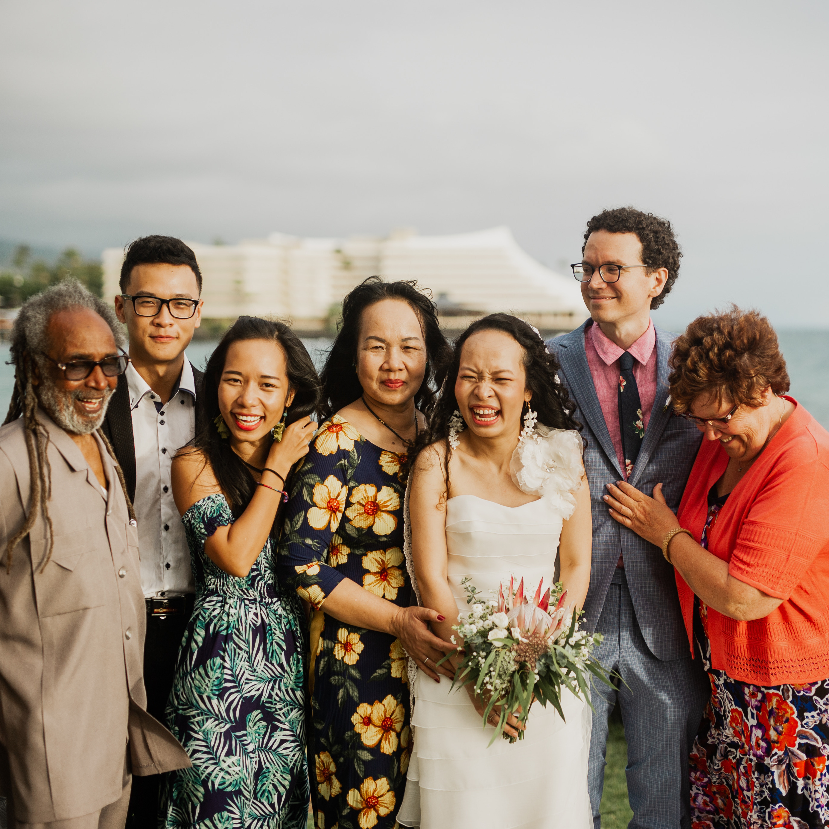 Verne (left) cracks a joke during the wedding photo shoot