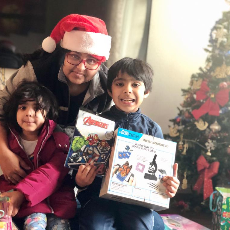 Chitrita with our friend's kids on Christmas Morning