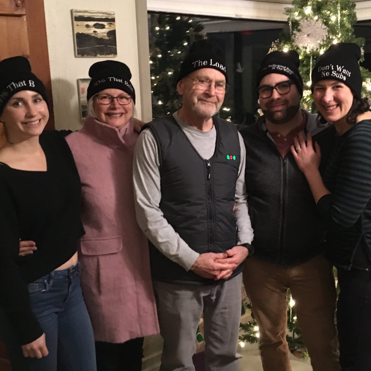 Cale's family at Christmas, with matching hats