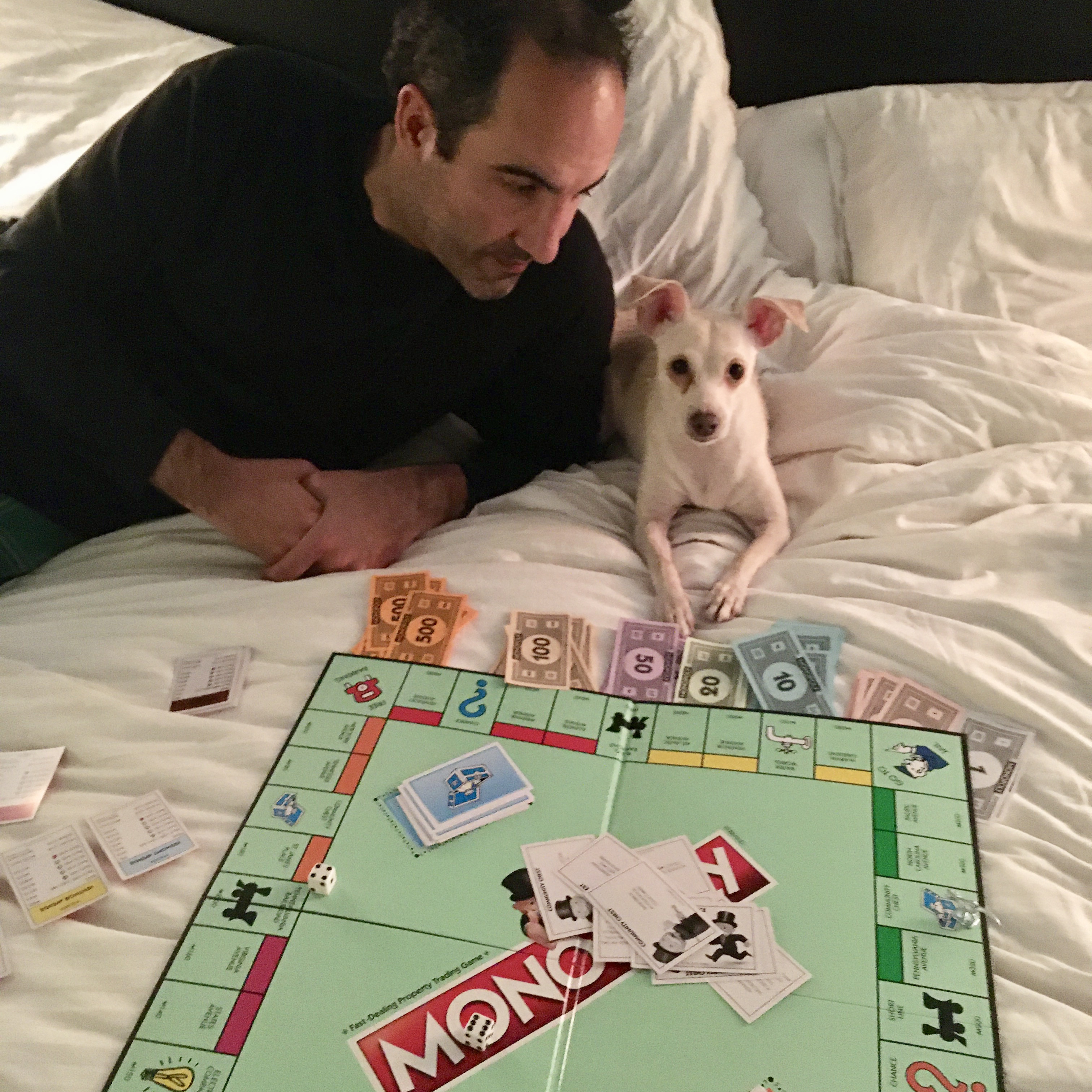 Our girl Helen holding it up as the most scrupulous of bankers --- one of MANY game nights.