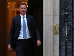 UK's new finance chief warns of tax hikes