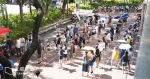 More than 200 people lined up in the scorching sun outside Tai Po Square, where the multi-district polling station was in good order