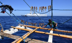 菲律賓指控中國漁民在黃岩島使用氰化物捕魚，準備蒐證狀告國際法庭