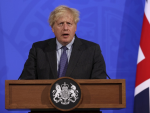 UK pushes back date to lift social distancing