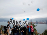 Families of 12 Hongkongers call for open trial