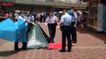 A police confession paper was left behind by the man who fell to the ground in Tsuen Wan