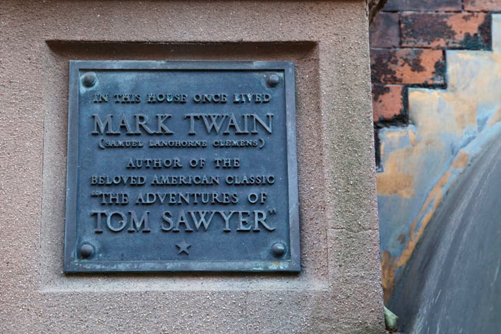Mark Twain lived here in the first years of the 20th Century. Plaque reads: In this house once lived Mark Twain (Samuel Langhorne Clemens), author of the beloved American classic The Adventures of...