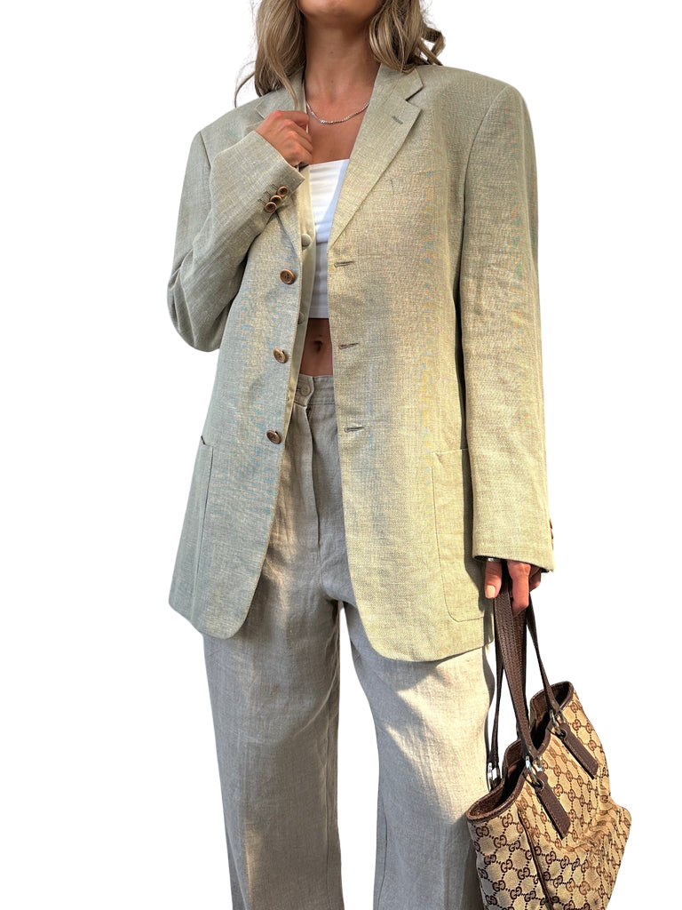 https://storage.googleapis.com/download/storage/v1/b/whering.appspot.com/o/marketplace_product_images%2Farmani-collezioni-linen-wool-single-breasted-blazer-gray-eihtaGBqXY4CVKv5rVSMPv.png?generation=1713839996826973&alt=media