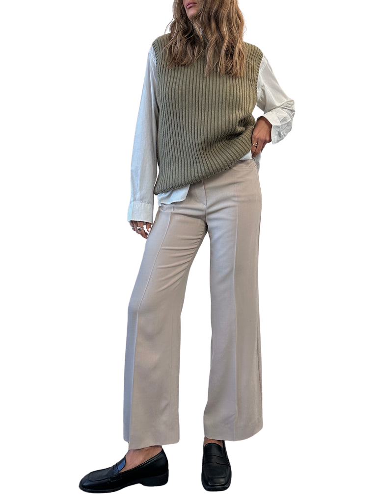 https://storage.googleapis.com/download/storage/v1/b/whering.appspot.com/o/marketplace_product_images%2Femporio-armani-wool-mid-waisted-pleated-trousers-beige-1n5kpEYKUhWTiVQsg4yMN5.png?generation=1713840300484819&alt=media