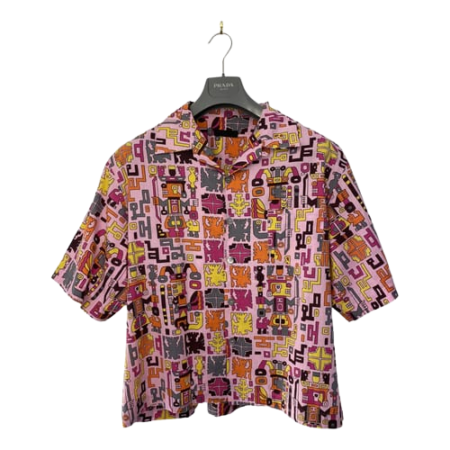 https://storage.googleapis.com/download/storage/v1/b/whering.appspot.com/o/marketplace_product_images%2Fprada-aztec-print-pink-bowling-shirt-multicolor-ogRa7XrV4PiVWQKeYFTXzA.png?generation=1677761702552072&alt=media