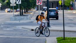 student riding a bike