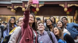 students take selfie while abroad