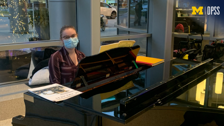 Guest Services Specialist Emily Wheeler played piano in the main lobby of Mott Children’s Hospital on the tense afternoon of Jan 6