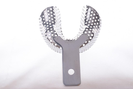 NM&G Perforated Lower Edentulous Tray | DentaCarts | Dental Cart