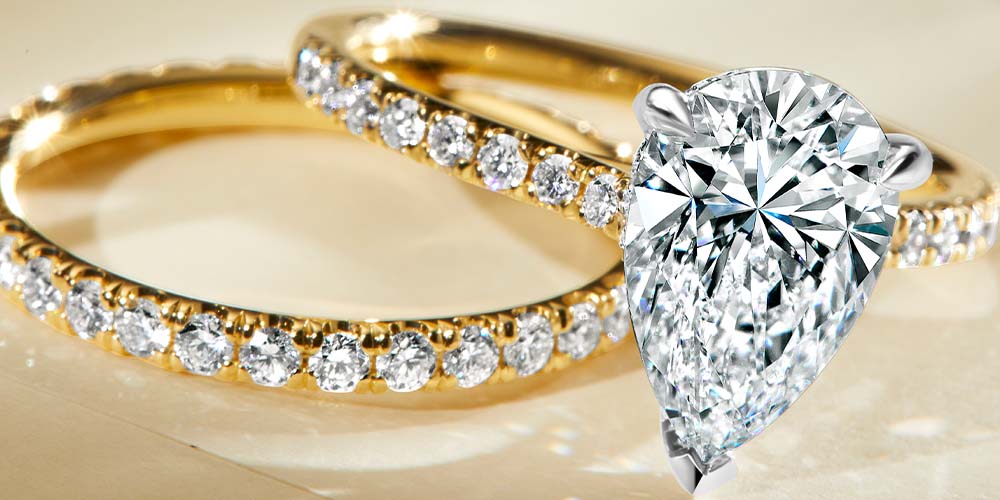 What does a Pear-Shaped Diamond Engagement Ring Symbolize? — New World  Diamonds