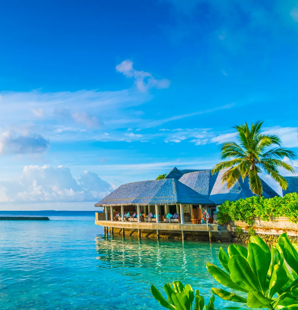 Overwater villa in tropical lagoon