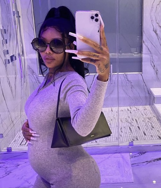 Summer shows off her latest baby bump.