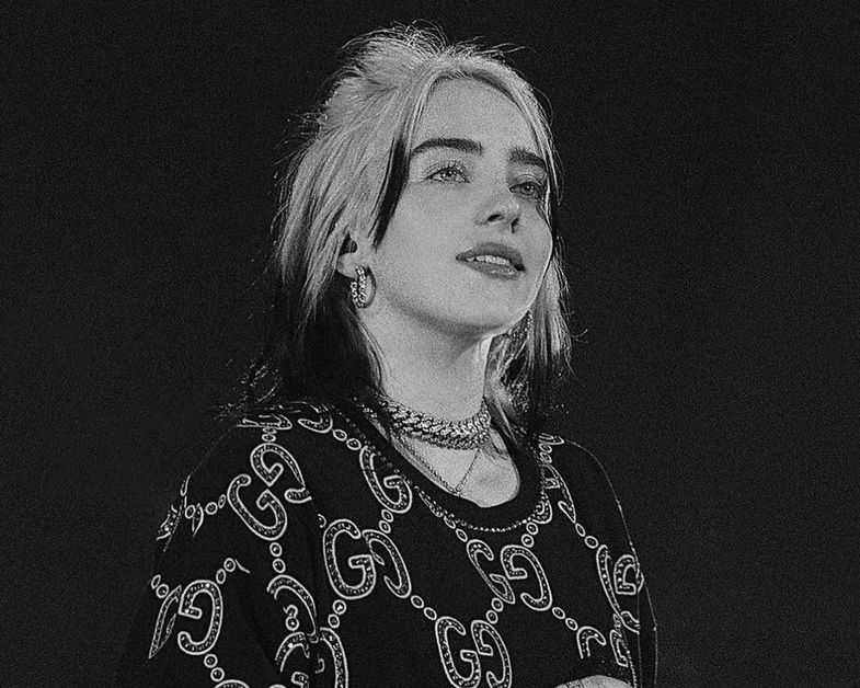 Billie Eilish with black and white shirt