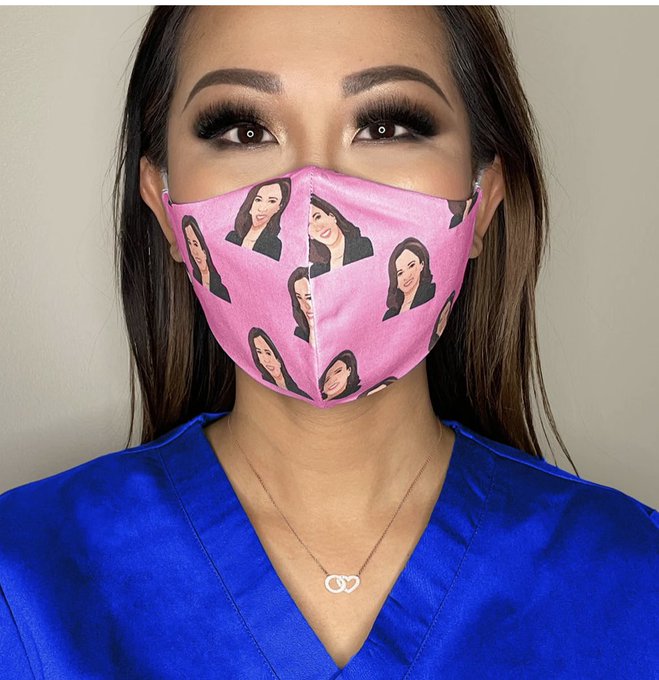 Dr. Tiffany Moon wears a mask with Kamala Harris' face.