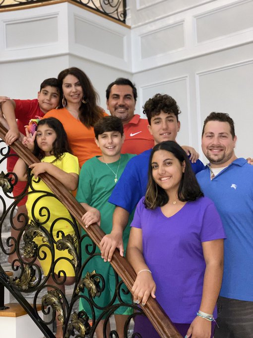 Jennifer Aydin and family wear rainbow T-shirts.